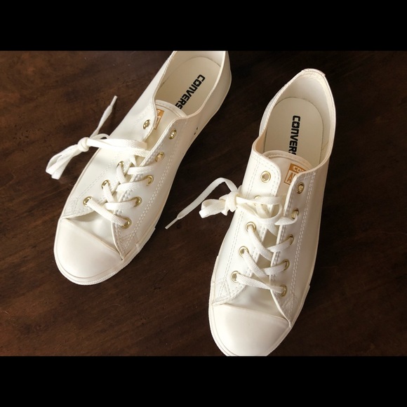white converse gold eyelets